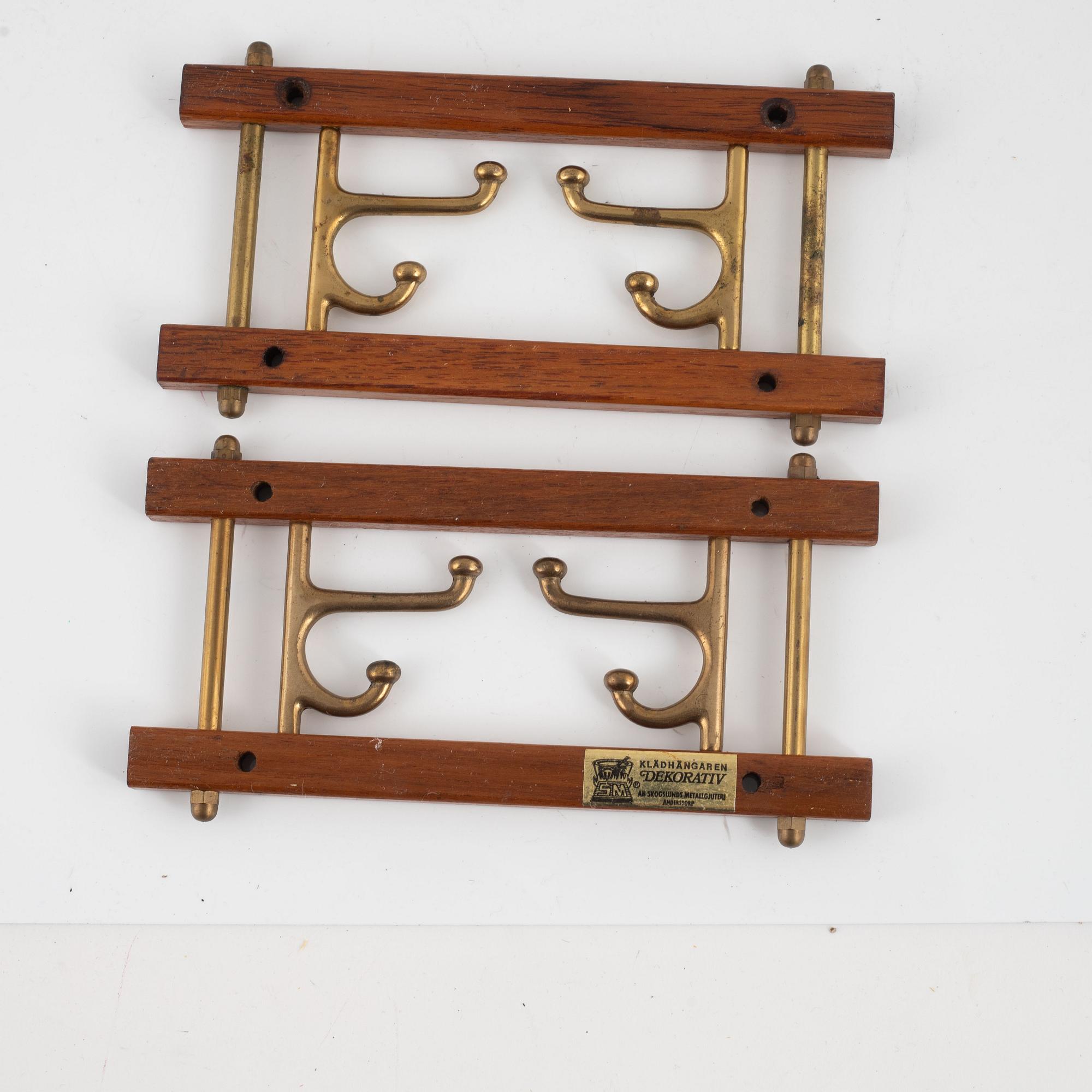 Klädhängare, 3 st, "Dekorativ", AB Skogslunds Metallgjuteri, Anderstorp, 1900-talets mitt.
