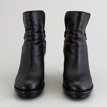 A pair of Acne boots, size 40.