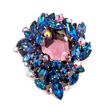 755. CHRISTIAN DIOR, a multi colored decorative glass stones brosche.