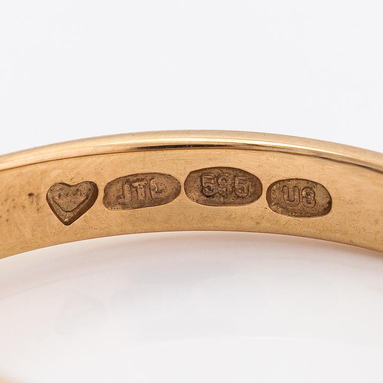 A 14K gold ring with diamonds ca. 0.21 ct in total. Finland 1997.