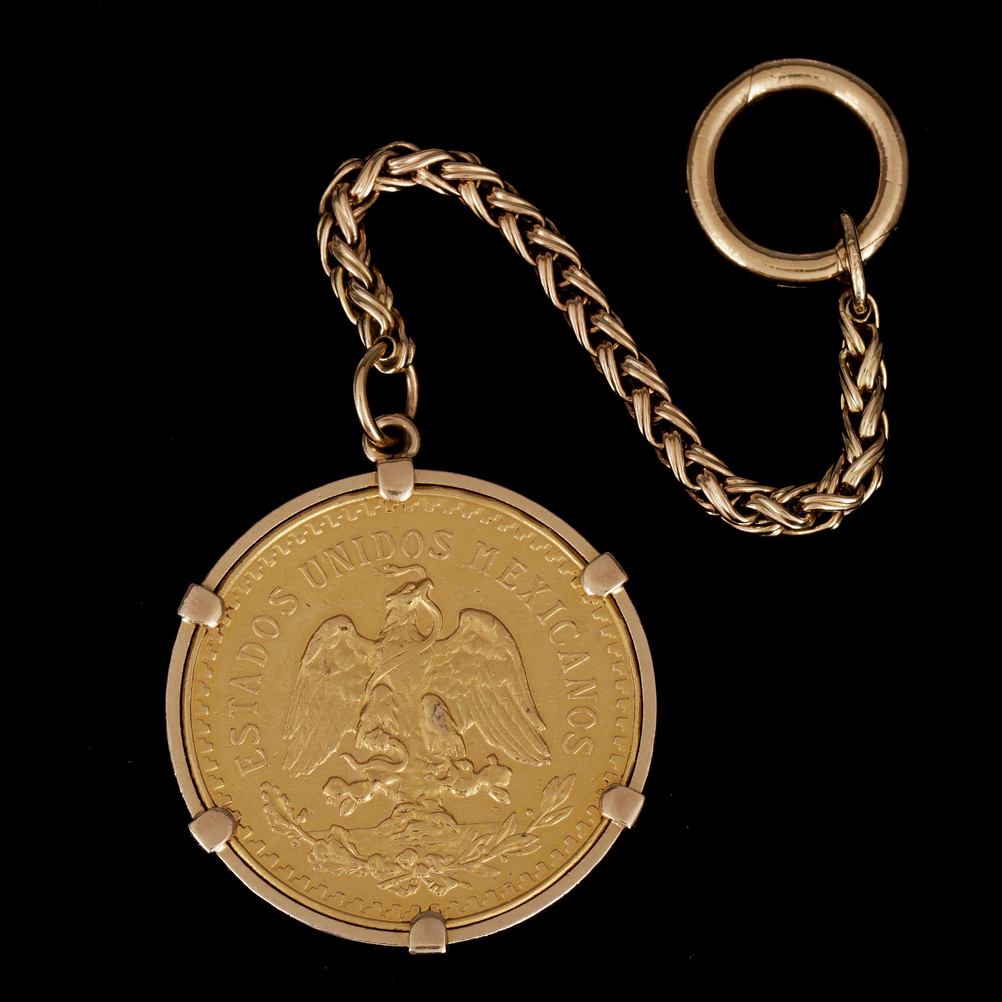 NYCEKLRING/MYNT, 18k och högkaratigt guld, 50 pesos, 1949-1972. Vikt ca60,9g.