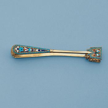 A Russian early 19th century silver-gilt and enamel sugar-tongs, unidentified makers mark, Moscow 1899-1908.