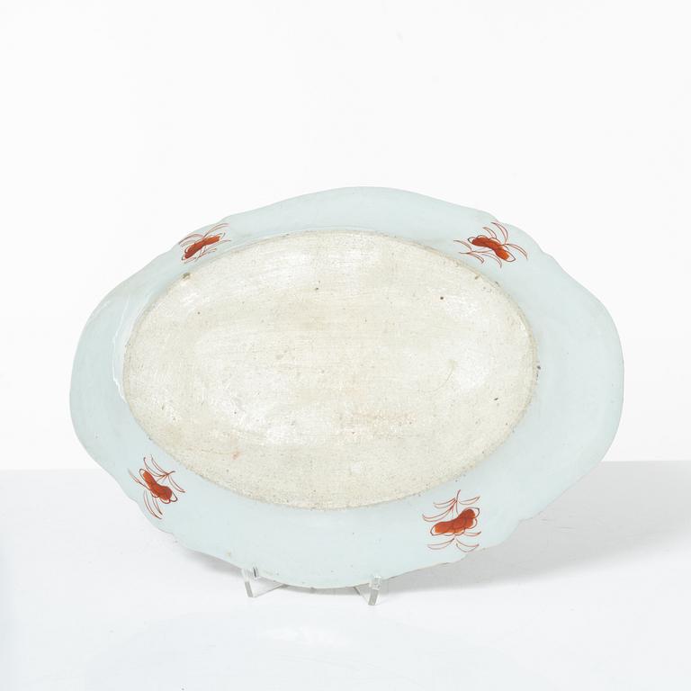 Two Chinese blue and white porcelain dishes and a small dish, Qing dynasty, 18th century.