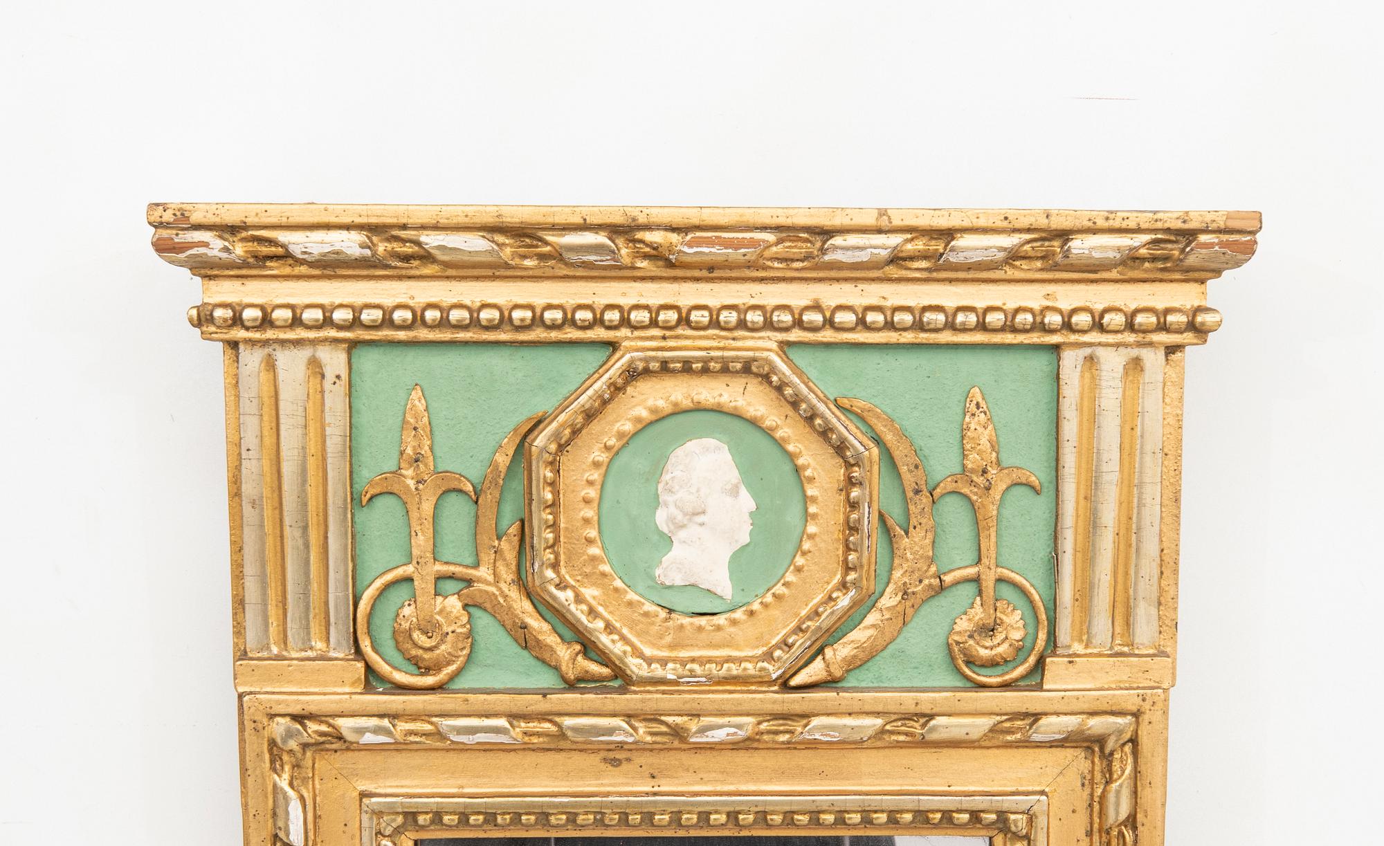 A gilded late Gustavian mirror around 1800.
