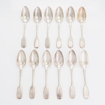 A set of 12 Morozov silver table spoons, master Adam Herttuainen. Imperial Warrant. St Petersburg 1908-17. In oak box.