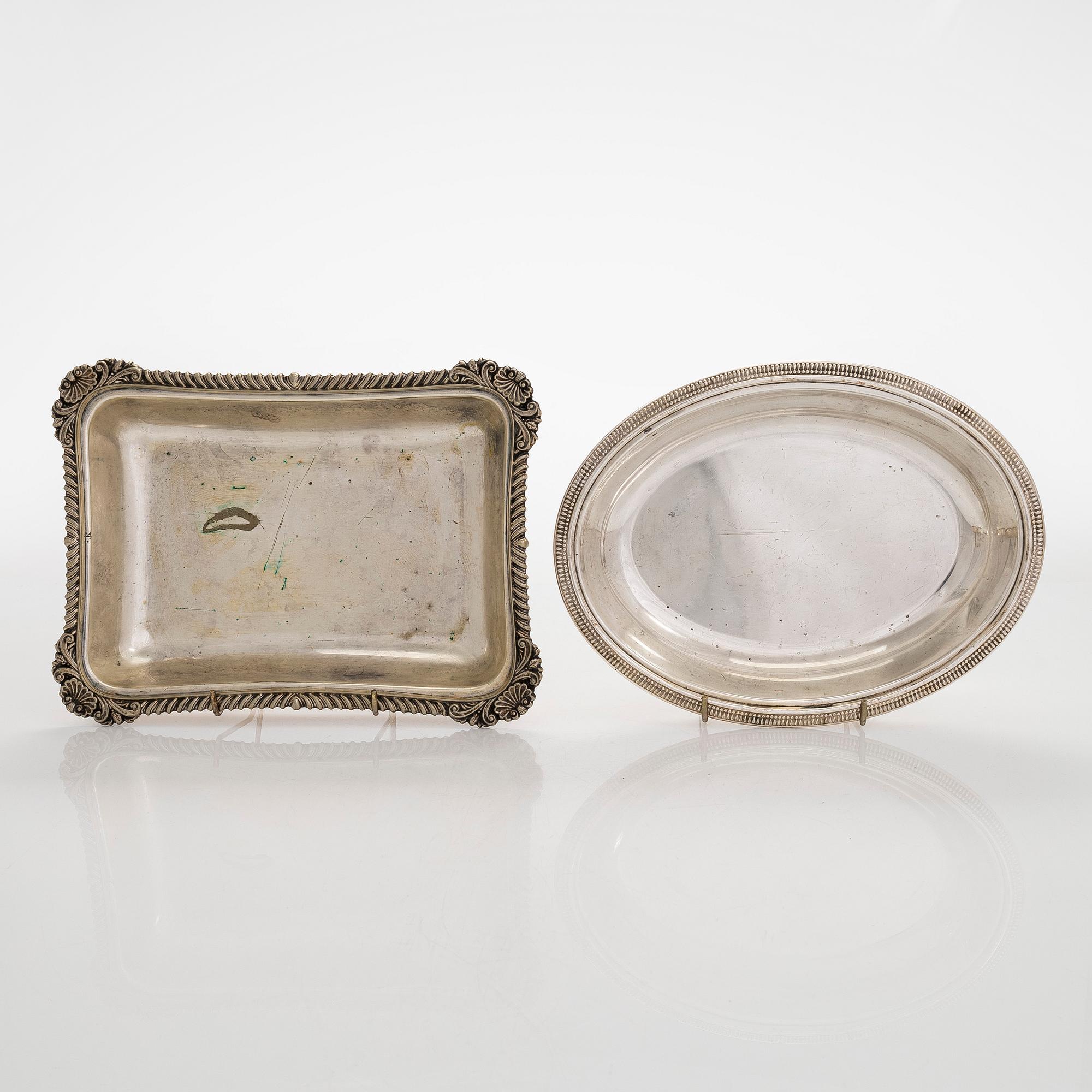 A set of four silver plated entree dishes, England.