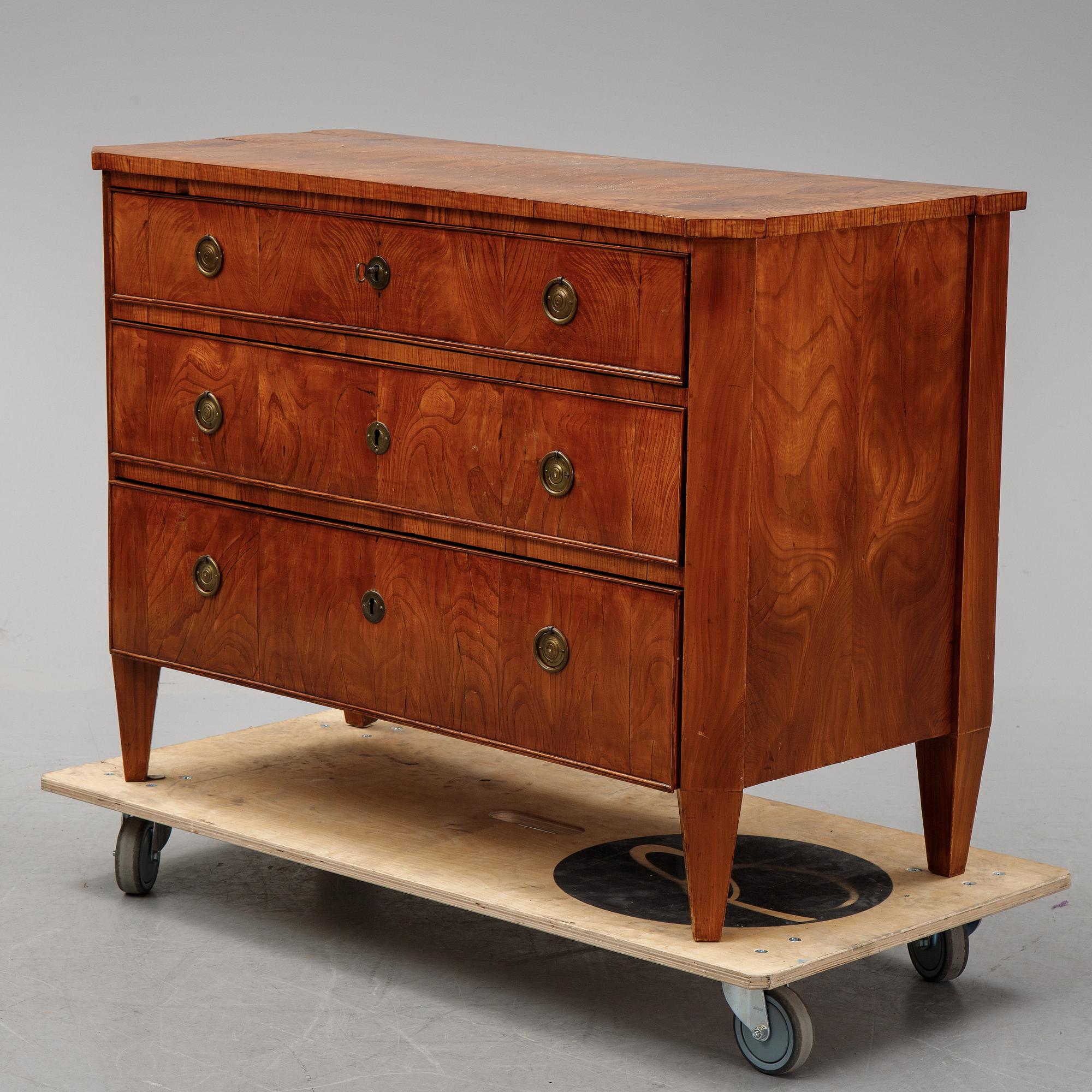 A late gustavian chest of drawers, ca 1800.
