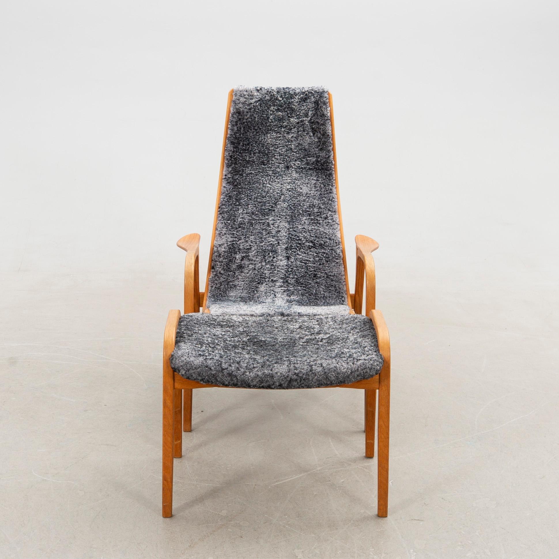 Yngve Ekström, armchair and footstool "Lamino", anniversary edition, Swedese.