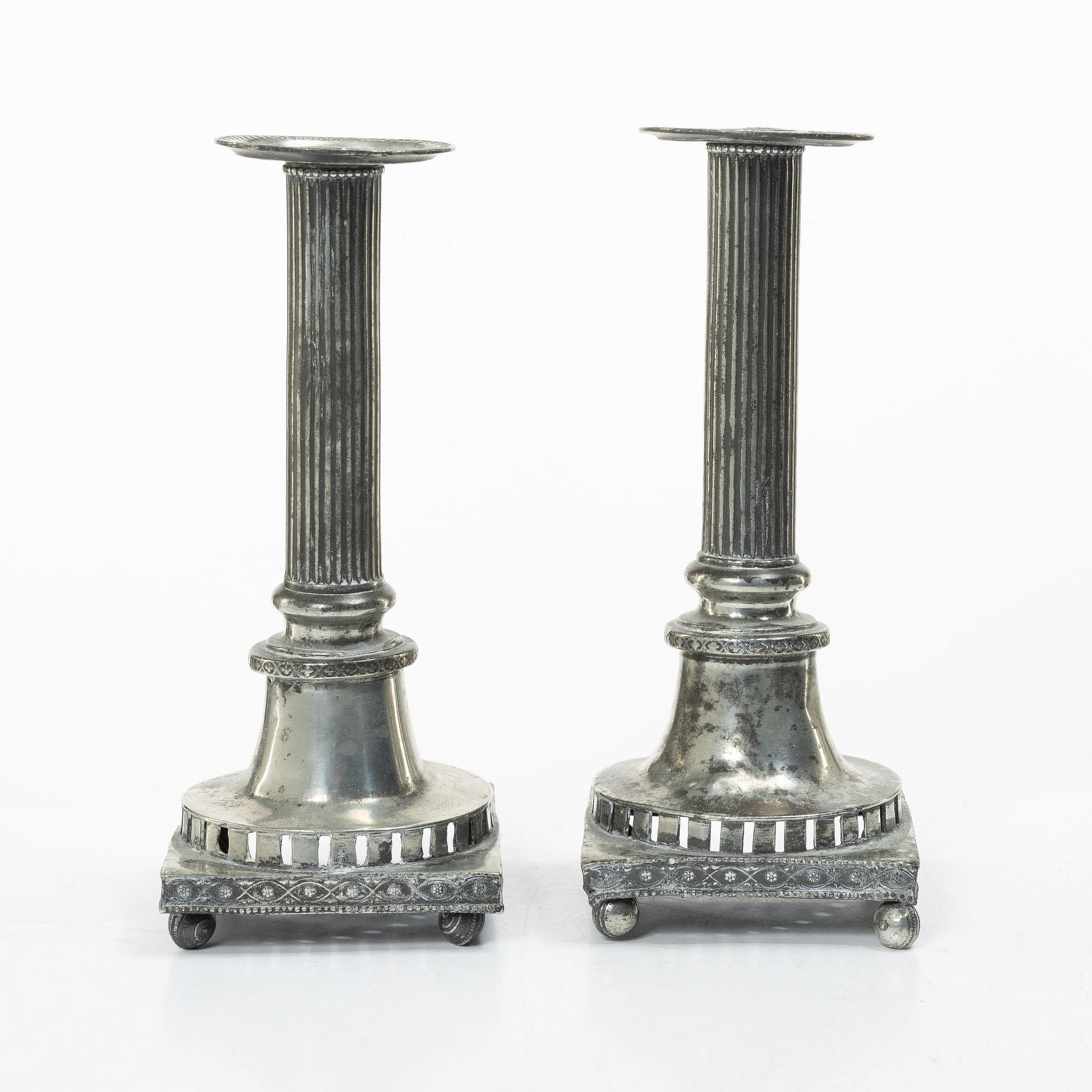 A pair of peuter candlesticks by Hans Wicksten (active between 1782-1810), Västerås.