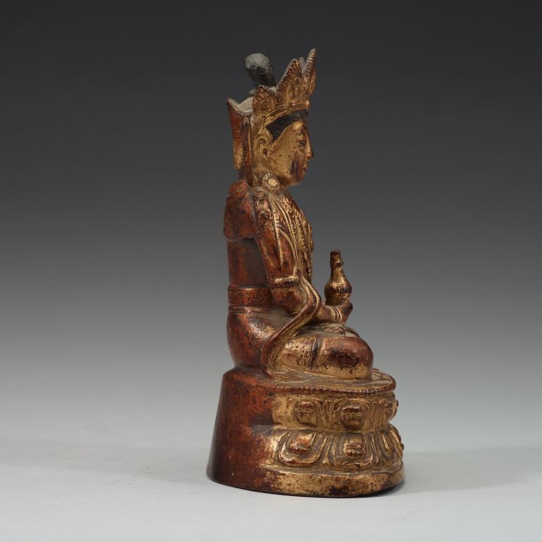 A gilt copper alloy sculpture of Guanyin, Ming dynasty (13668-1644).