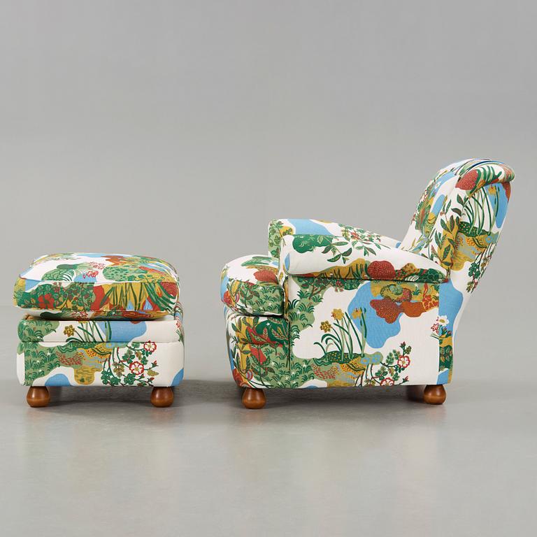 A Josef Frank armchair with ottoman, model 336, Svenskt Tenn Sweden.