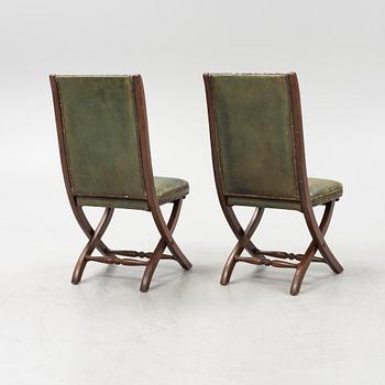 A set of five mahogany and leather upholstered chairs, England, second half of the 20th Century.