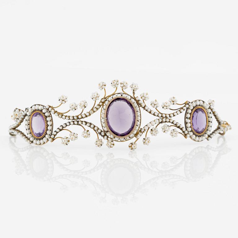 Tiara with amethysts and seed pearls.