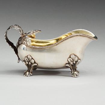A Swedish 18th century parcel-gilt cream-jug, makers mark of Anders Schotte, Uddevalla 1793.