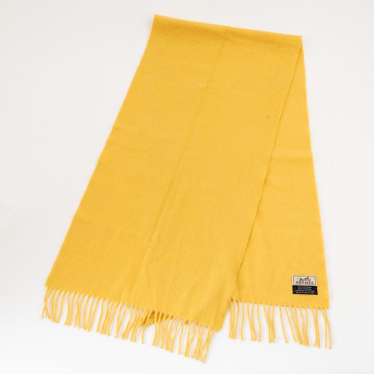 Hermès, a yellow cashmere scarf.