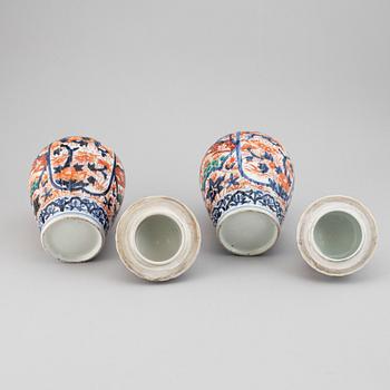 A pair of imari vases with covers, Japan, Meiji (1868-1912).