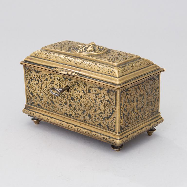 A Renaissance style brass box, Adolf Frankau & Co, London, from the late 19th century.