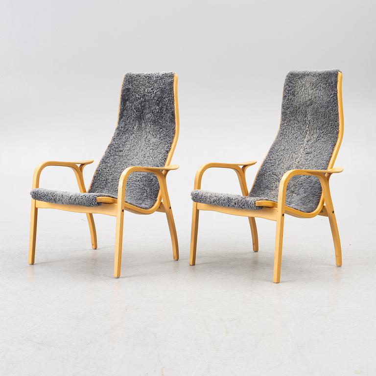 Yngve Ekström, a pair of 'Lamino' easy chairs, Swedese 2004.