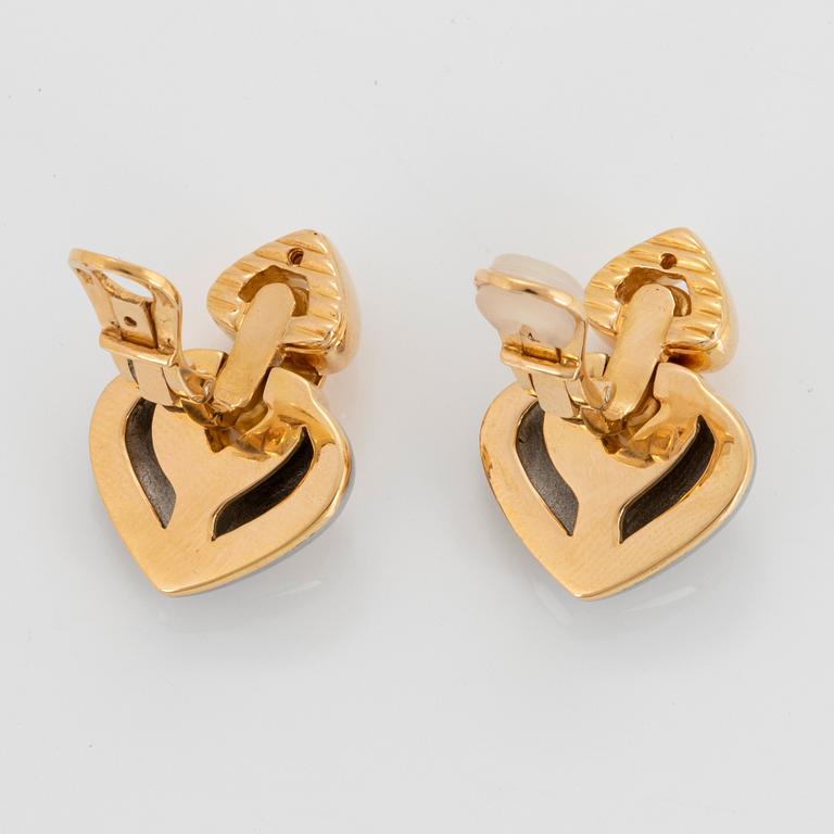 A pair of 18K gold and steel Bulgari earrings.