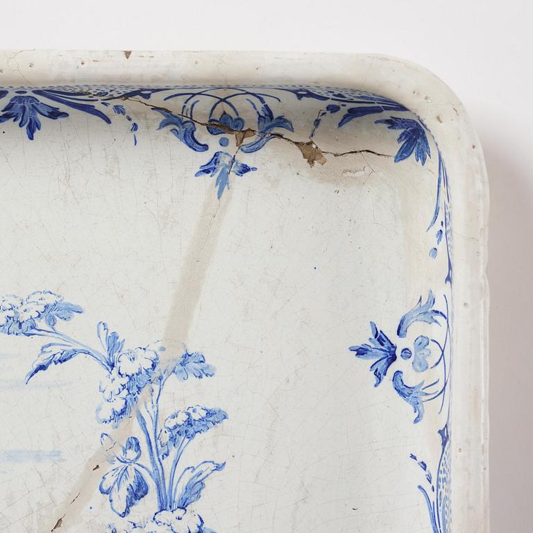 A rococo faience-top tea table, Rörstrand 1760.