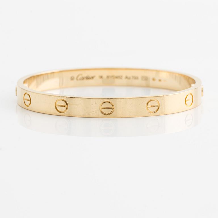 An 18K gold Cartier bracelet "Love".