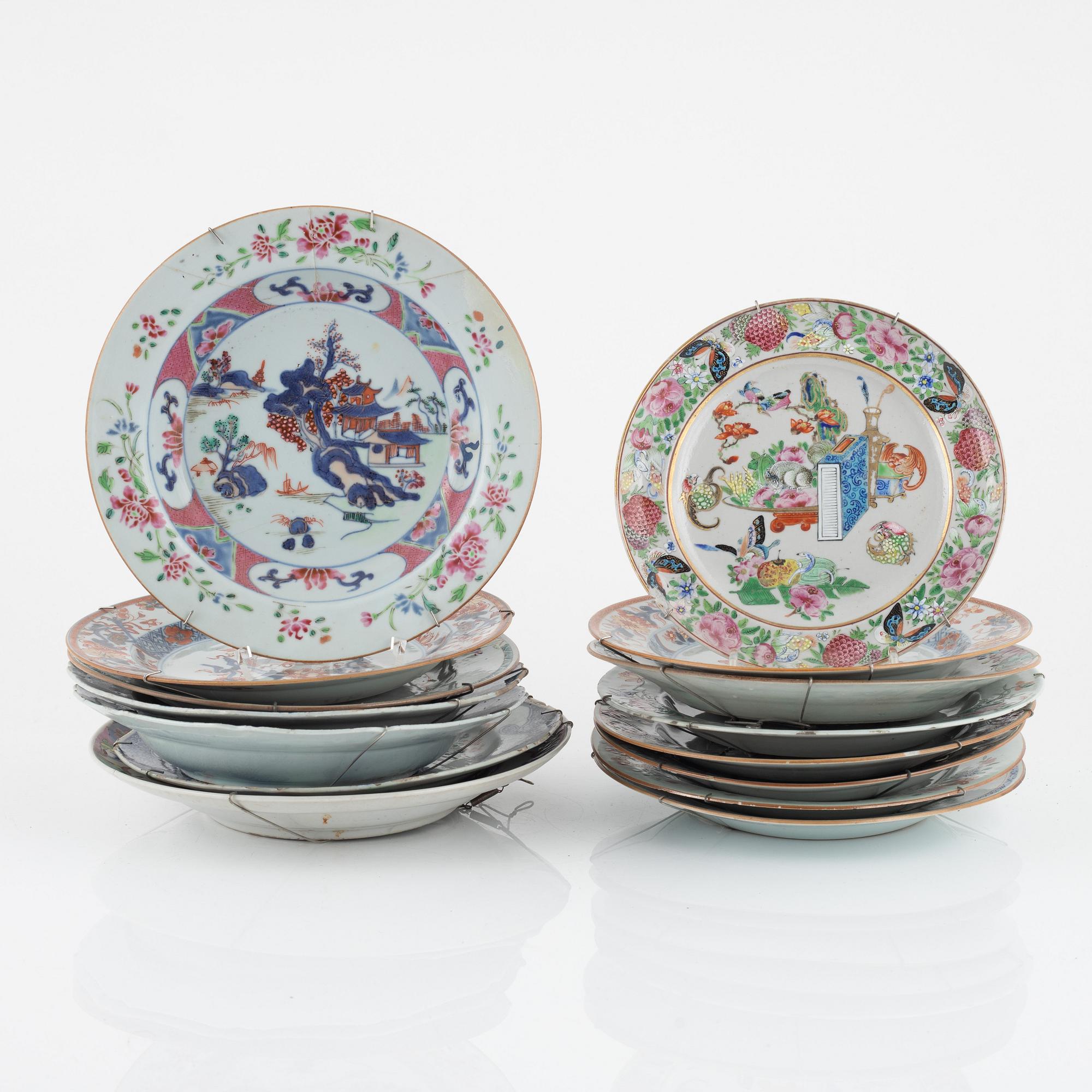 A set of 15 famille rose dinner plates, Qing dynasty, Qianlong and one Canton 19th Century.