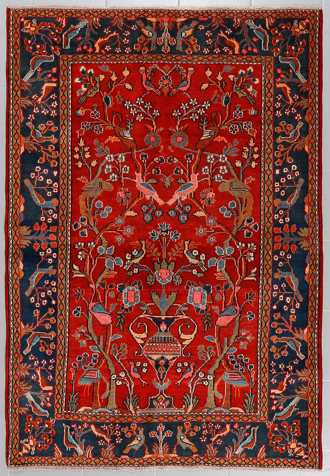 AN OLD/SEMI ANTIQUE ARAN RUG, 194 x 130 cm.