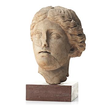 A marble head of a woman, probably Roman 100-200 AD.