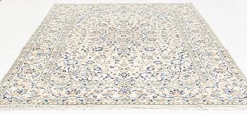 A Kashan carpet, ca 352 x 239 cm.