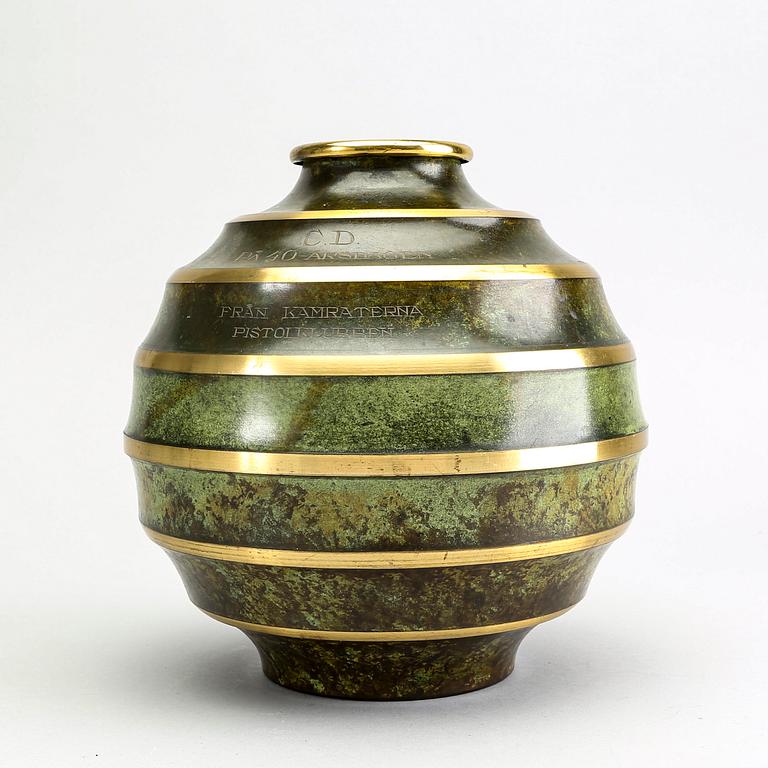 A Swedish Art Deco metal vase.