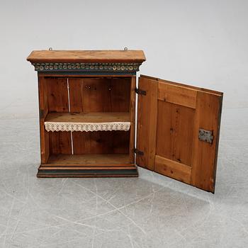 A Swedish painted cabinet from Hälsingland, dated 1831.
