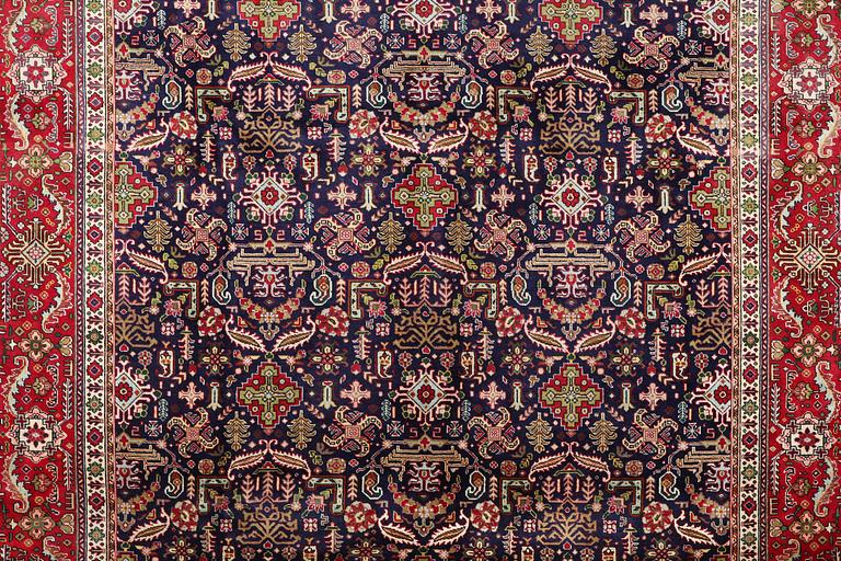 A Tabriz carpet, c. 369 x 277 cm.