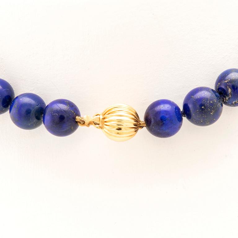 Halsband lås 18K guld och kulor av Lapis Lazuli.