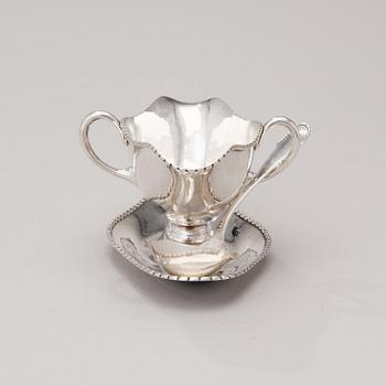 A sauce boat with a sauce ladle in silver, mark of Paul Bang, Copenhagen, Denmark 1929 and 1930s.