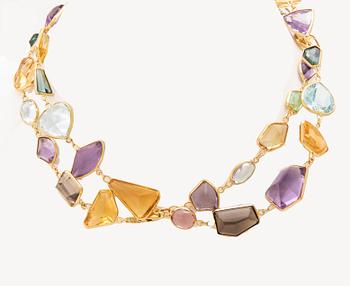 An 18K gold necklace set with various faceted gemstones, possibly H.Stern.