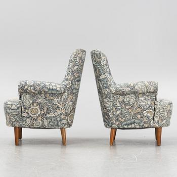 Carl Malmsten, a pair of Hemmakväll easy chairs .