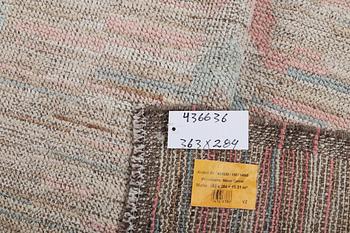 A Moroccan carpet, c. 363 x 284 cm.