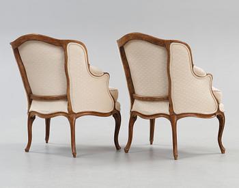 A pair of Louis XV 18th century armchairs.