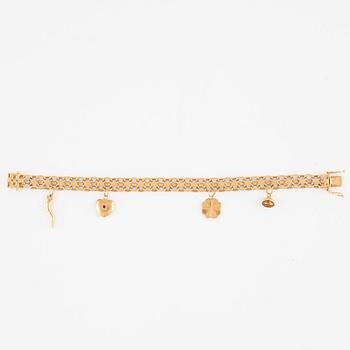 Bracelet 18K gold with charms.