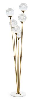A brass and marble floor lamp, attributed to Stilnovo, Italy 1950's.