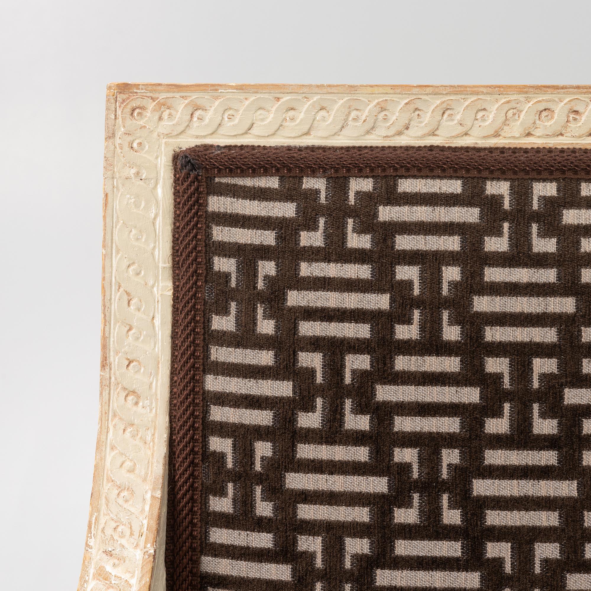 A Gustavian open armchair, Stockholm, late 18th century.