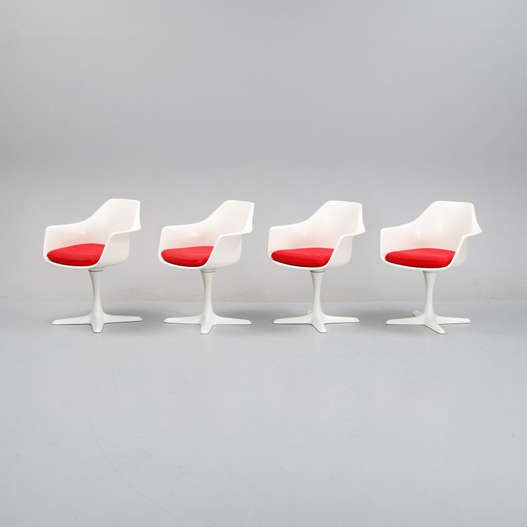 A dining set with a table and four chairs by Maurie Burke for Arkana, second half of the 20th Century.