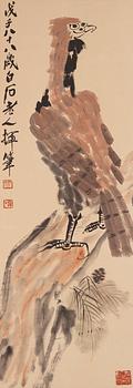 A scroll painting depicting a bird of pray, after Qi Baishi (1868-1957).