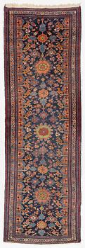 A north-west Persian, semi-antique runner, c. 340 x 110 cm.