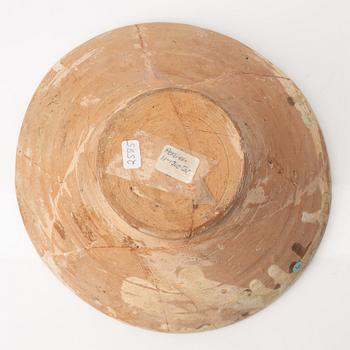 A glazed earthenware bowl, possibly Hispano-Moresque.
