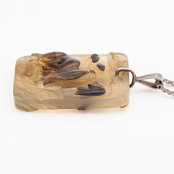 An inscribed and well carved agate 'Scholar and attendant' pendant, Qing dynasty, probably 19th century.