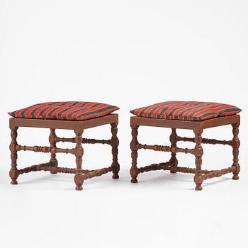 A pair of Swedish baroque stools, circa 1700.