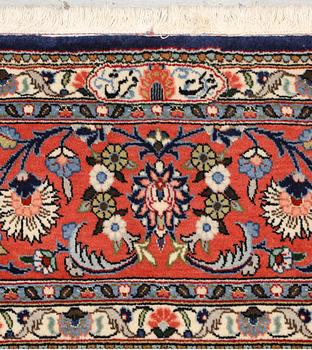 A part silk Sarouk rug, signed, approx. 240 x 208 cm.