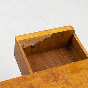 A pair of birch veneered 1930's bedside tables.