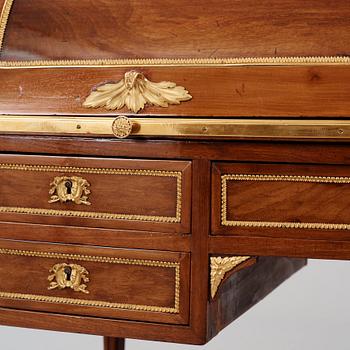 A Louis XVI-style mahogany and ormolu mounted 'bureau a cylindre', later part of the 19th century.